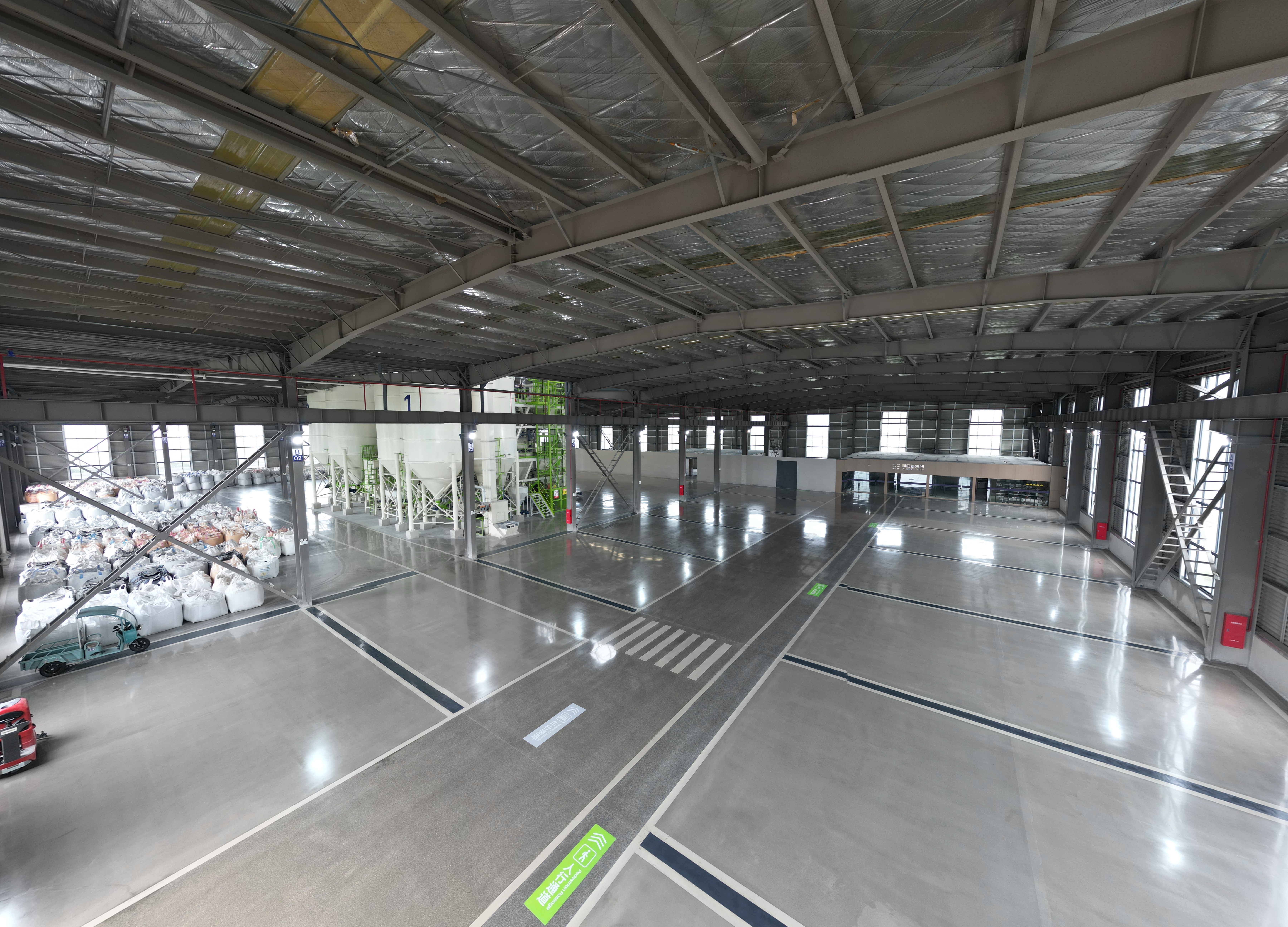 Wide interior view of the finished-goods warehouse