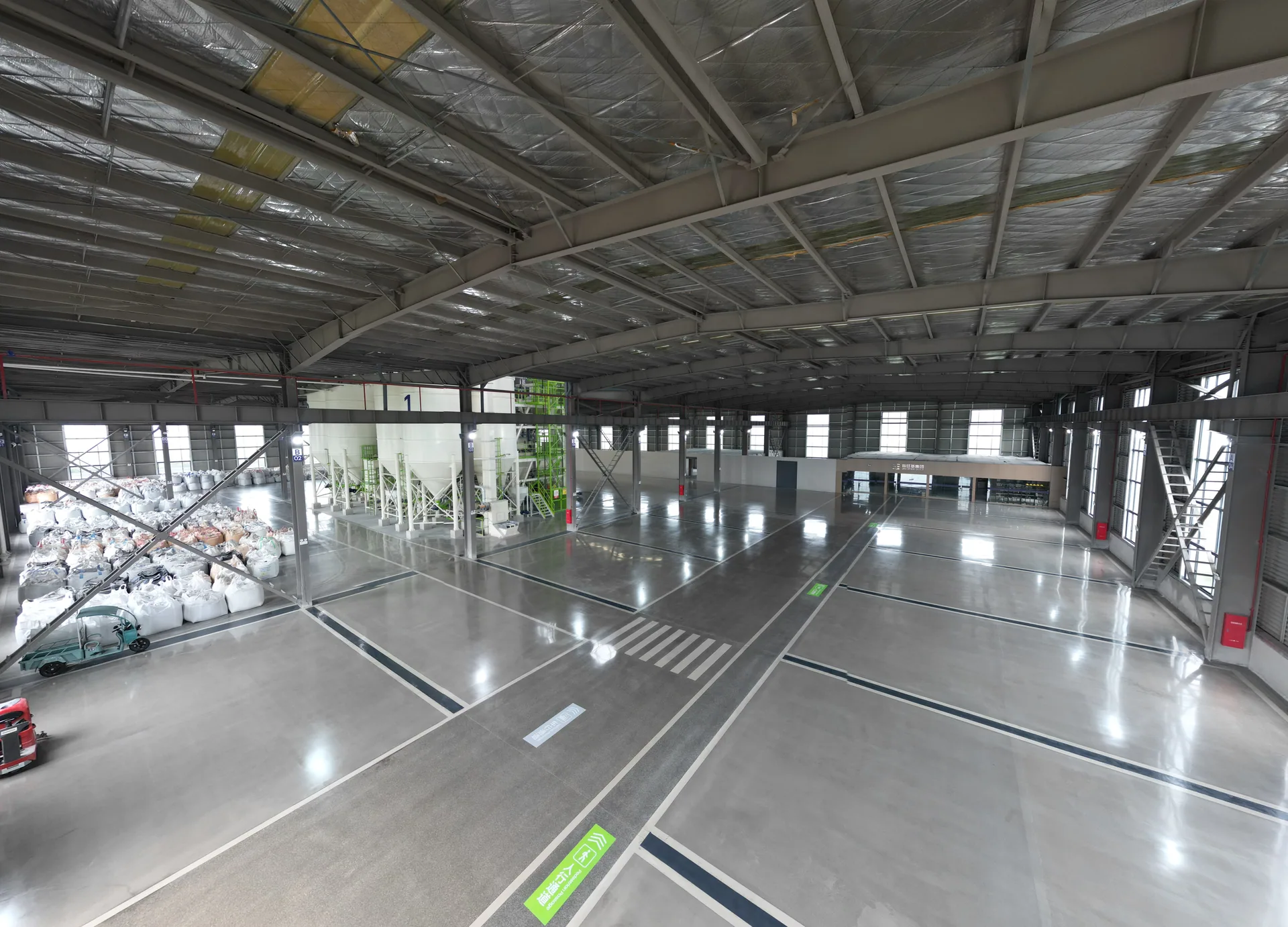 Wide interior view of the finished-goods warehouse